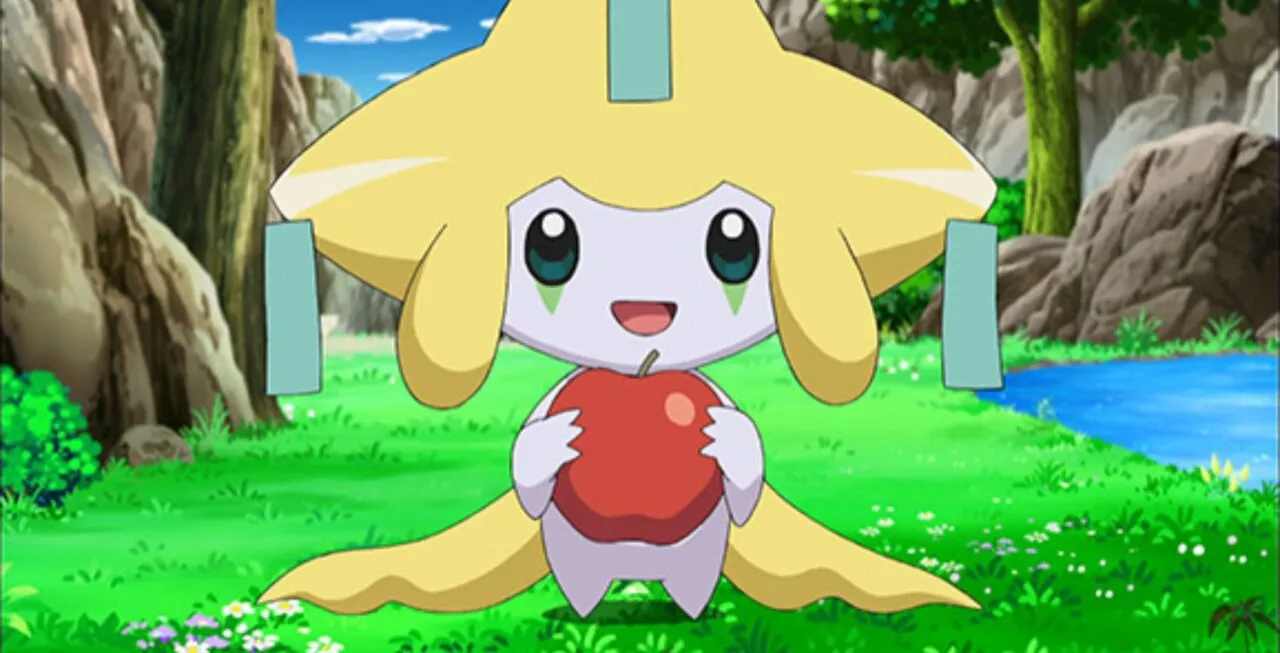 Jirachi com maçã e sorrindo