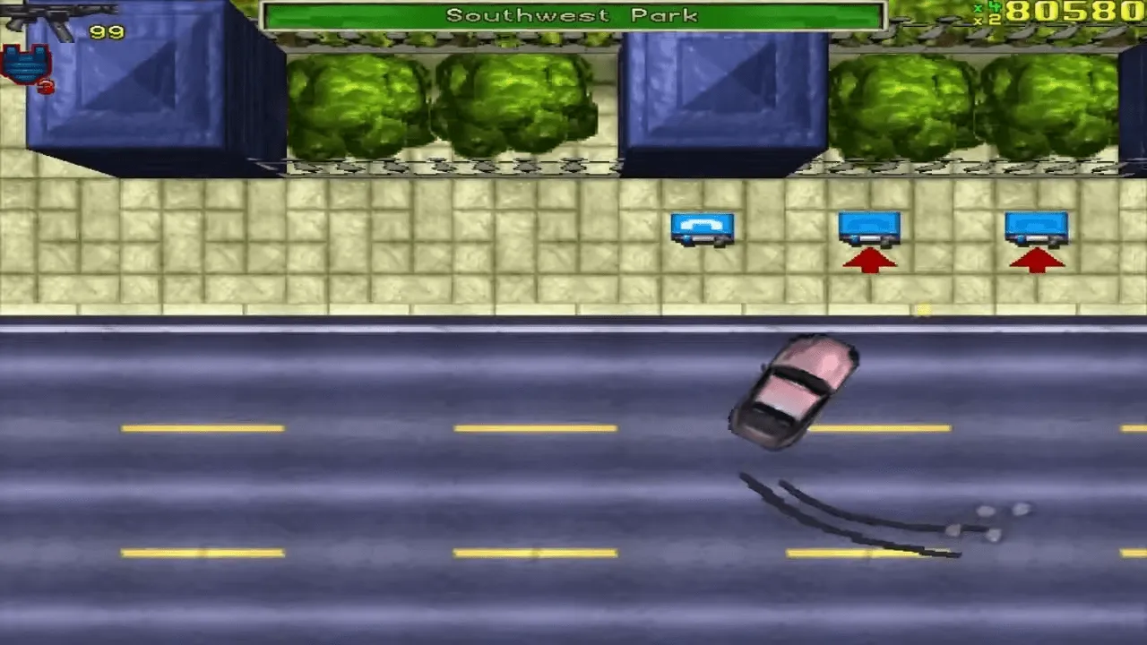 Captura de tela de Grand Theft Auto, onde tem um carro próximo a cabines telefônicas em uma rua do distrito de Southwest park