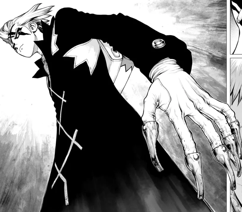 Homem usando um casaco preto longo. Ele também parece ter unhas longas feitas de metal. Ele tem cabelos brancos e um X em sua testa.
