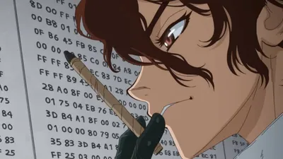 homem de cabelos castanhos segurando lápis à altura da boca olhando para o lado