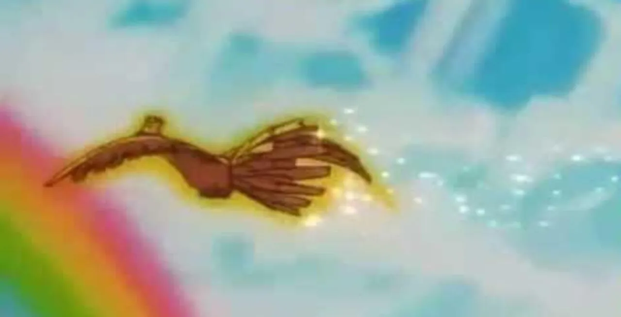 Ho-Oh voando próximo a um arco-íris