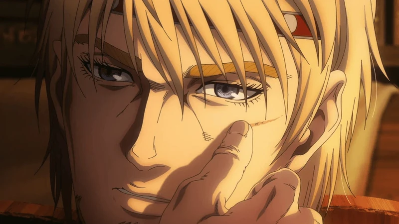 Frame focado no rosto de um personagem de Vinland Saga