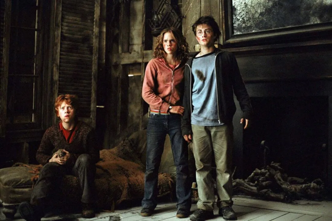 Ron Weasley (Rupert Grint), Hermione Granger (Emma Watson) e Harry Potter (Daniel Radcliffe)