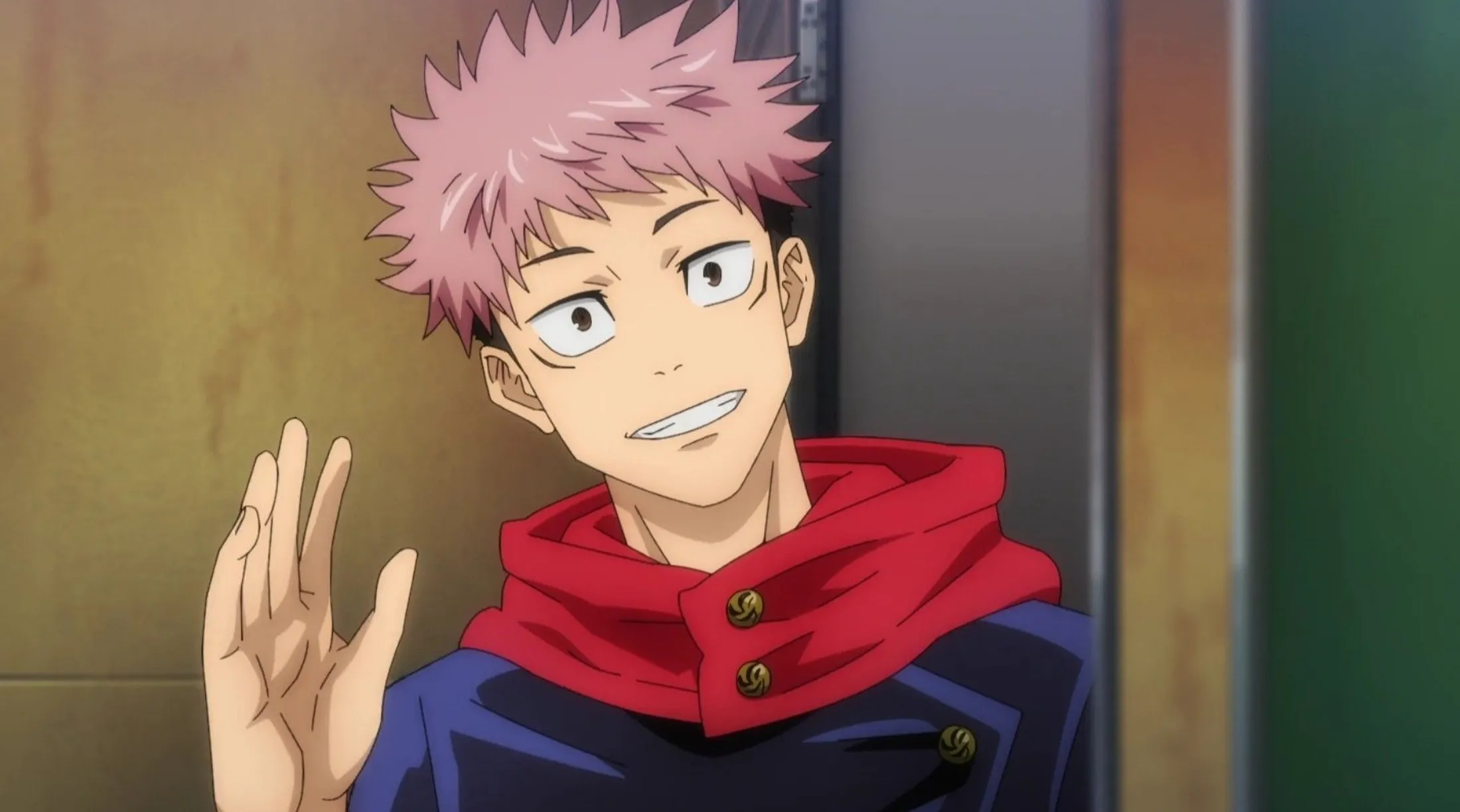 itadori-dando-um-sorriso-e-acenando-com-a-mao-direita