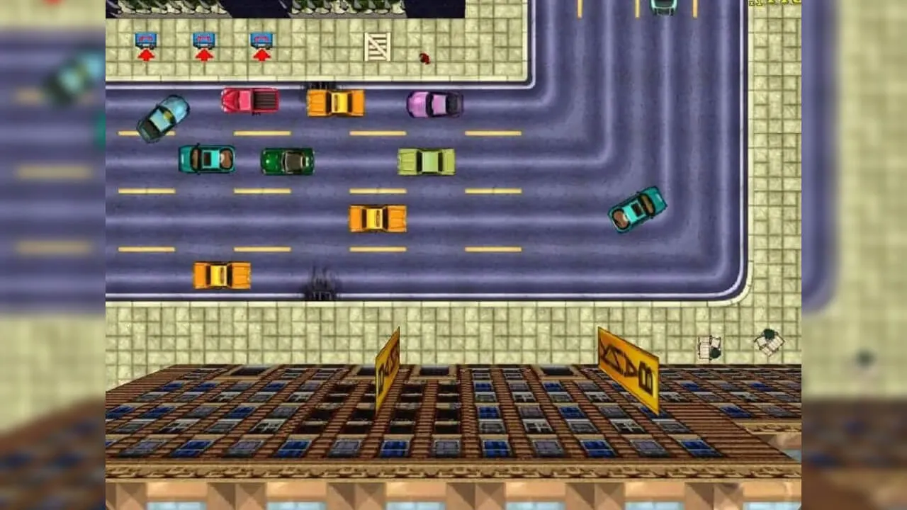Captura de tela de Grand Theft Auto, onde exibe uma rua com carros e um prédio de um banco
