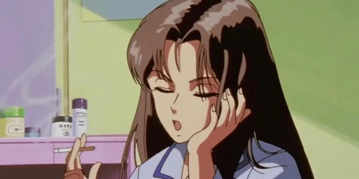 Atsuko falando com a mão no rosto e desinteressada