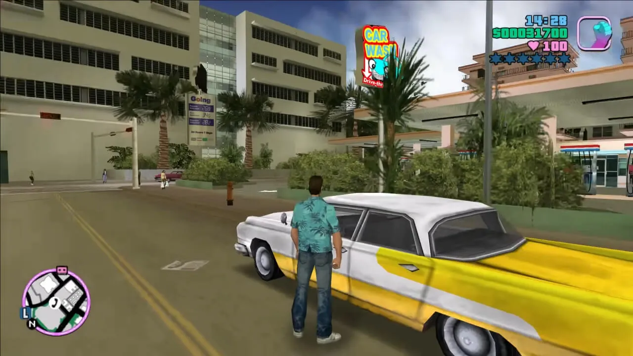 personagem virtual ao lado de um carro estacionado em frente à um lava-rápido e posto de combustível