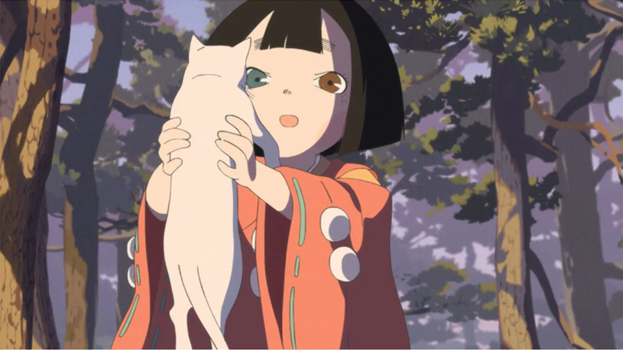 Menina com olhos de cor diferentes segura um gato branco
