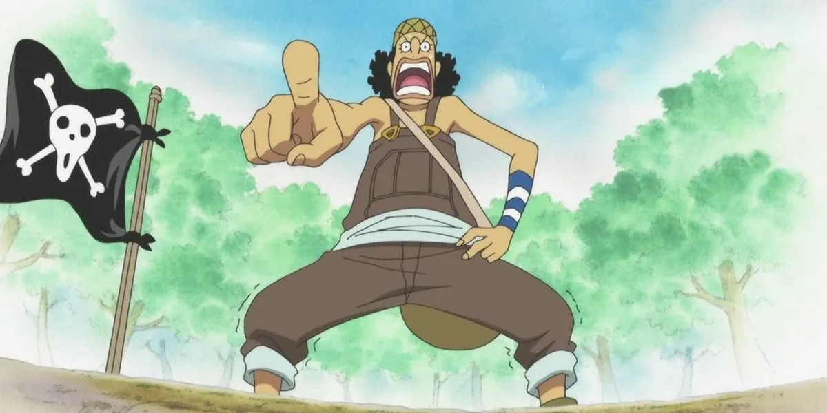 Usopp apontando para frente e com a mão na cintura