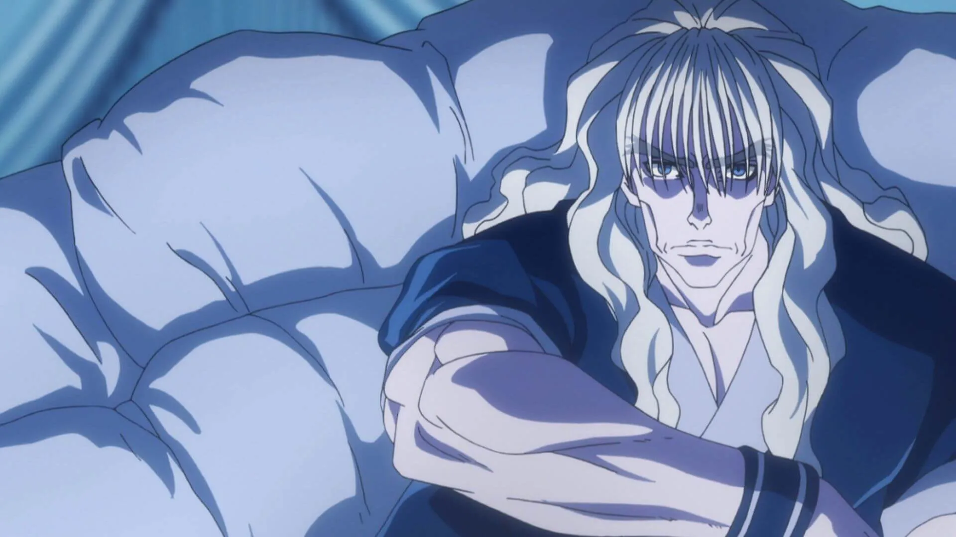 Silva sentado com seu braço direito apoiado na perna direita