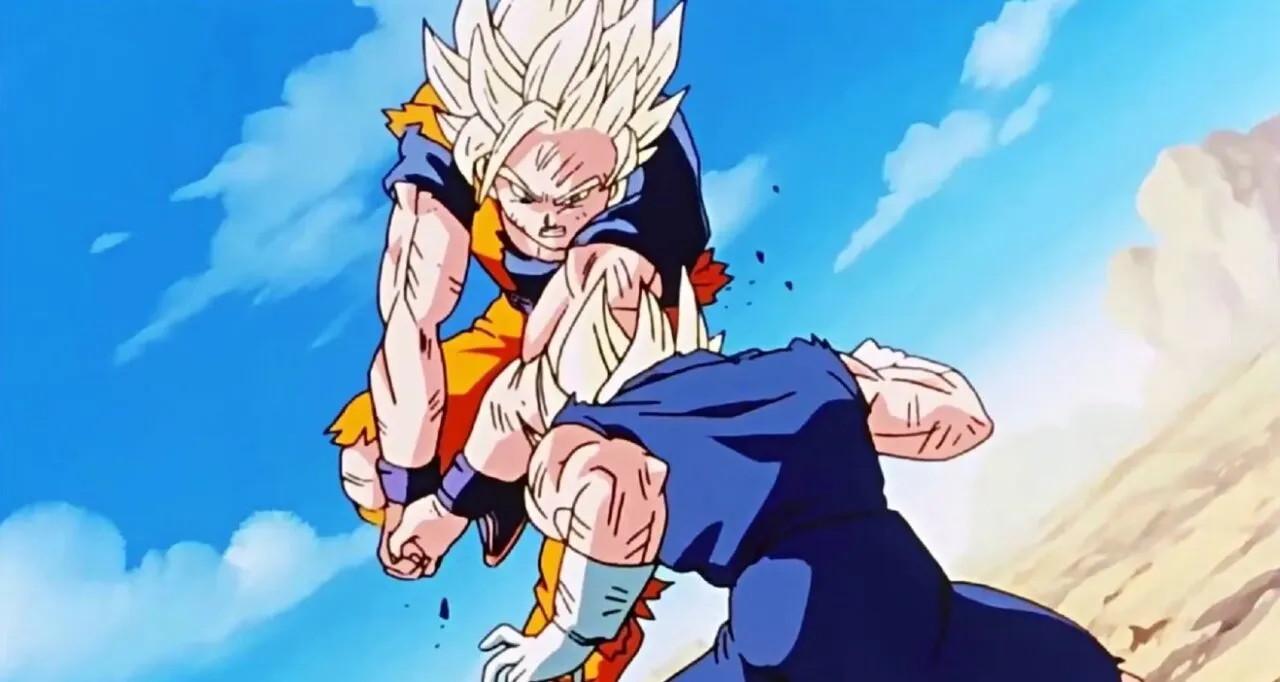 goku-super-saiyajin-acertando-um-golpe-no-topo-da-cabeca-de-vegeta-super-saiyajin