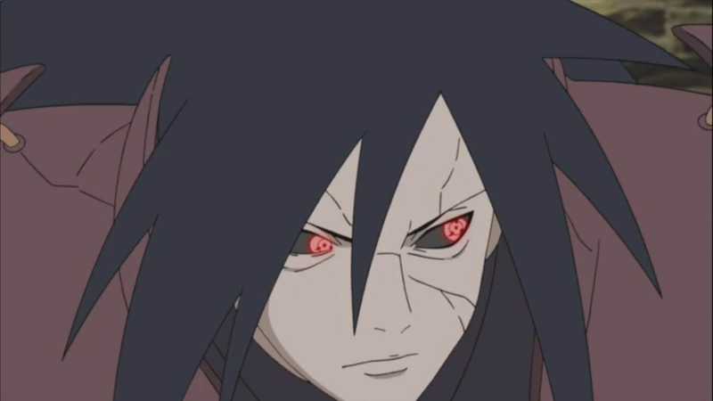 madara usando se sharingan enquanto luta na guerra contra as nações.