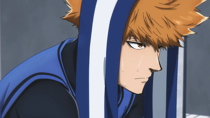 kunigami usando uma blusa azul por cima de sua roupa padrão do blue lock, sentado e olhando para frente enquanto está suado em seu rosto