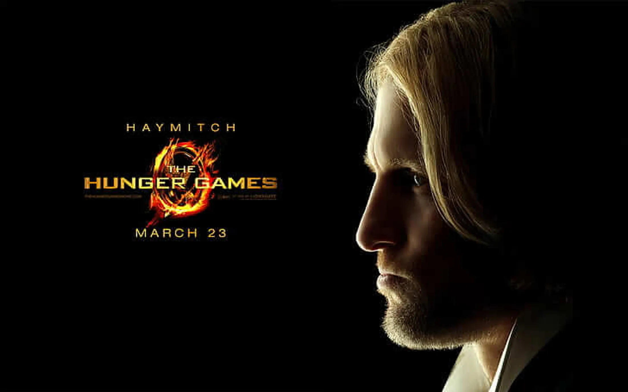 Woody Harrelson é quem da vida a versão adulta de Haymitch Abernathy nos filmes. | Imagem: Divulgação.