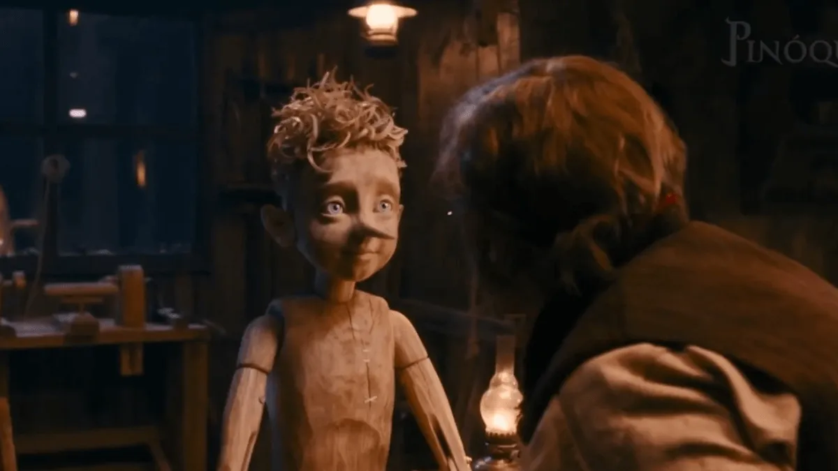 Pinóquio em live-action olhando para Gepeto