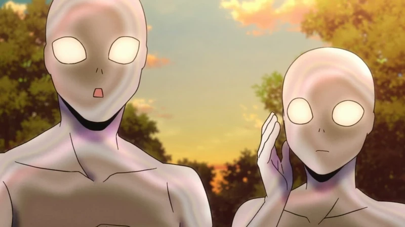 Dois alienígenas cinzas olhando para a frente surpresos