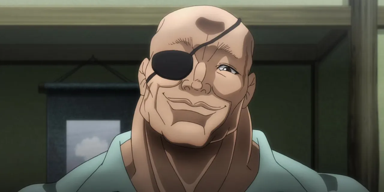 Doppo sorrindo enquanto usa seu tapa olho
