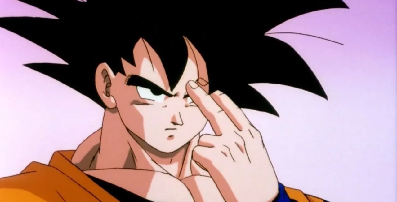 Goku com olhar sério se preparando para usar o Teletransporte