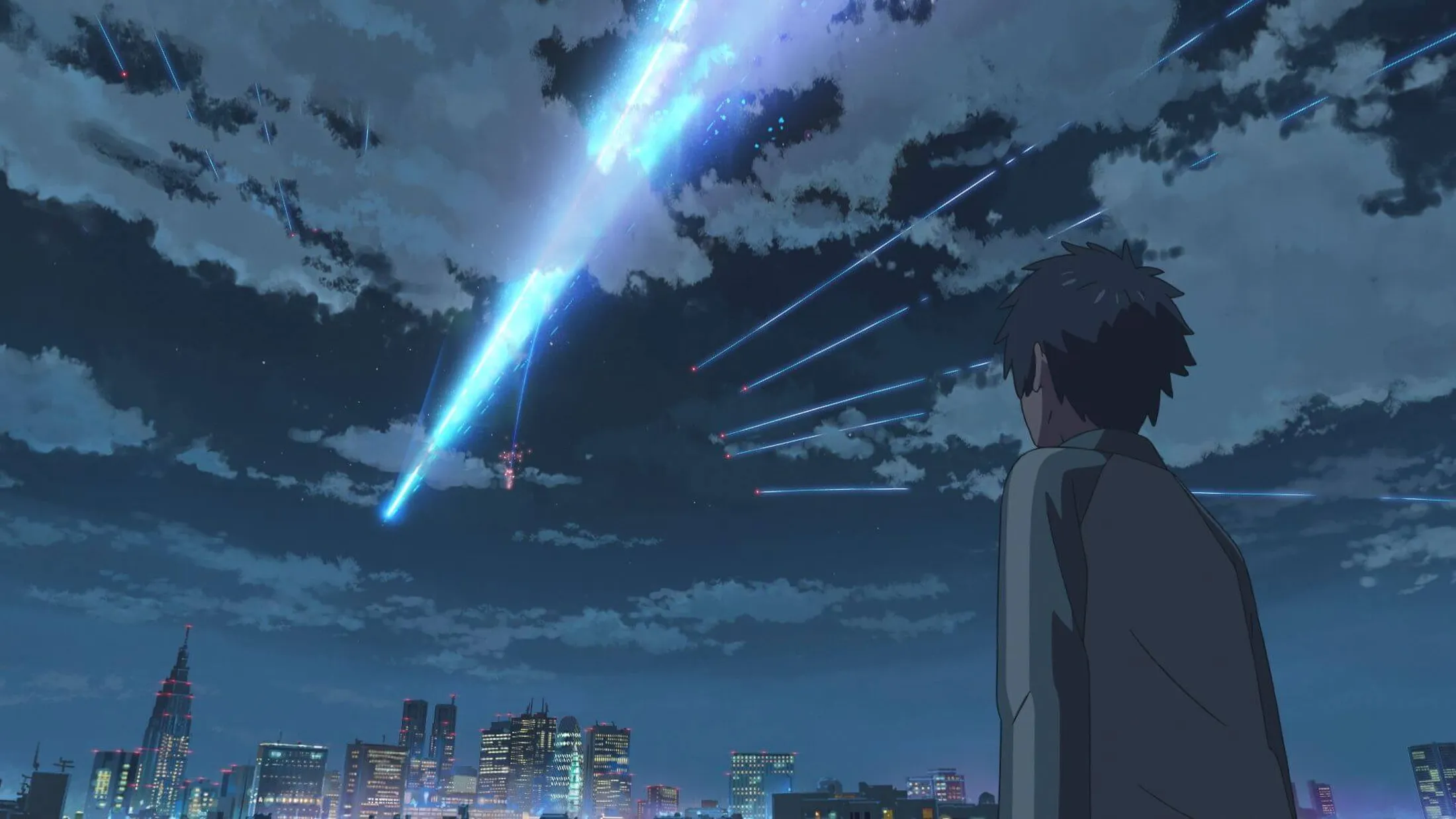 Taki olhando um cometa, na noite, sozinho