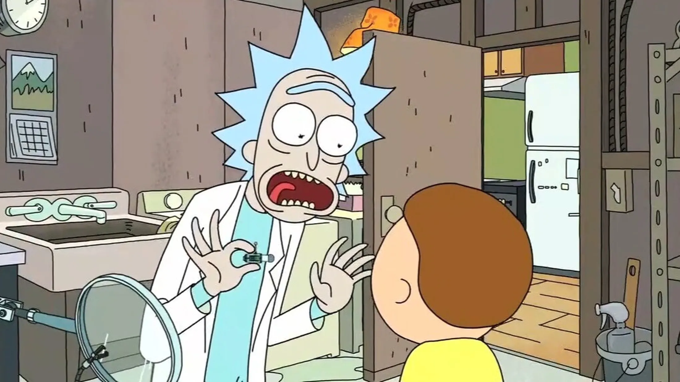Rick de boca aberta impressionado olhando para Morty