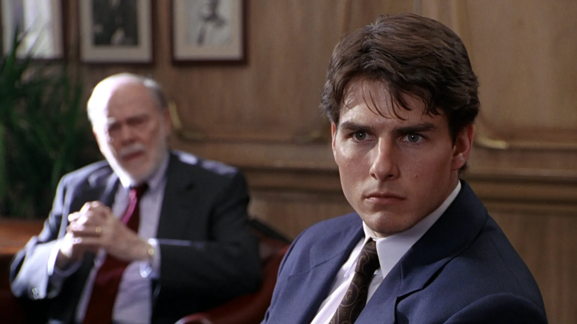 Tom Cruise é John Grisham em A Firma. Foto: Divulgação