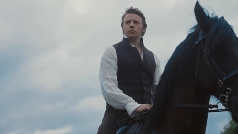 homem montado em cavalo olhando para o lado